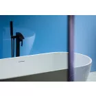 Lagoon Gloss Cladding installed in a bathroom showing a white bath.