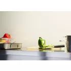 Linen Satin Cladding installed above a stainless steel kitchen worktop. The surface is holding a chopping board, pans, utensils and various colourful peppers.