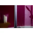 Plum Gloss Cladding installed in a bathroom showing a still wet shower screen and reflection of shower head in the cladding.