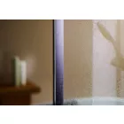 Sandstone Satin Cladding in a bathroom behind wet shower screen.