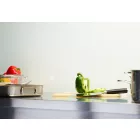 White Gloss Cladding installed above a stainless steel kitchen worktop. The surface has a chopping board, pans, utensils, and various colourful peppers.