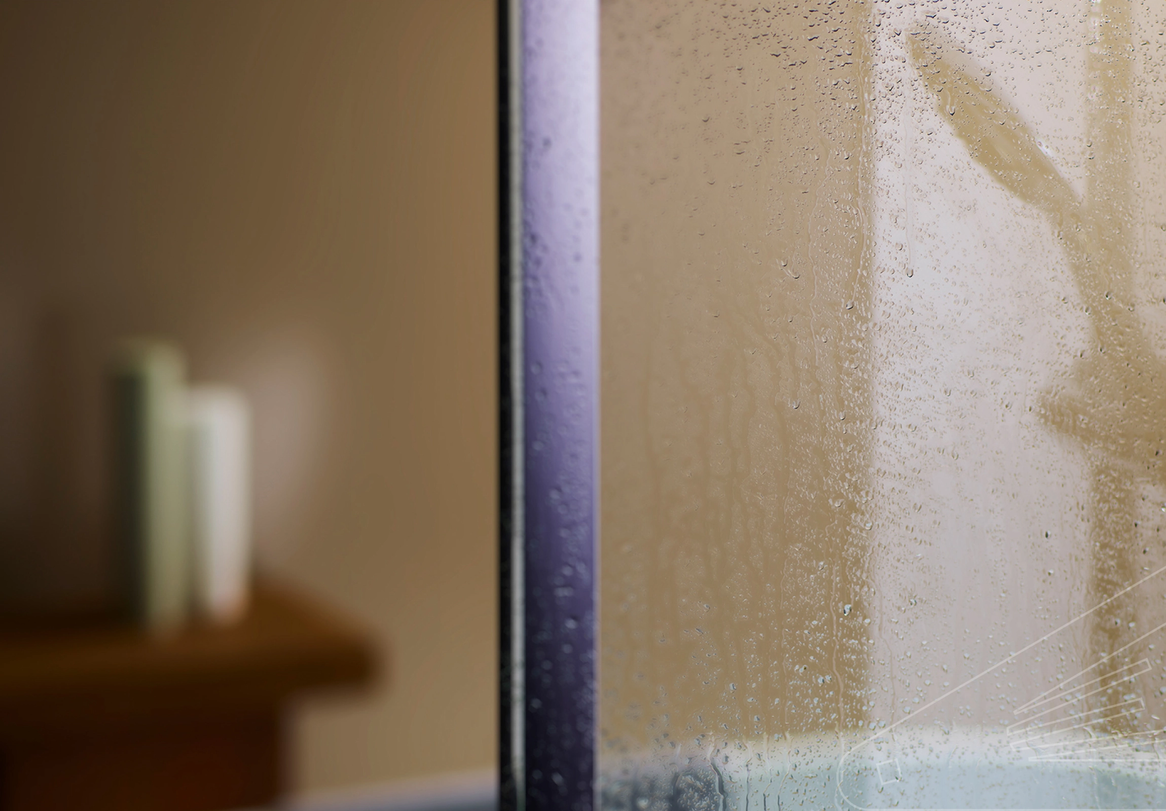 Sandstone Satin Cladding in a bathroom behind wet shower screen.