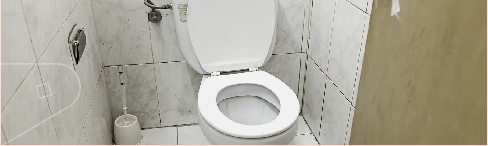 Dirty toilet with discoloured dirty tiles and grout, build up of dirt and germs