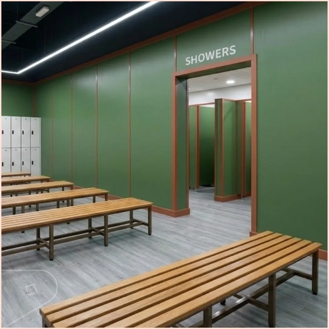 Forest cladding with Sandstone profiles in gym changing room.