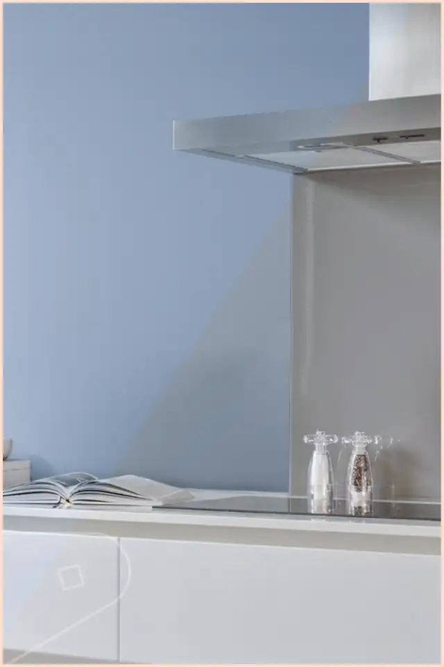 Cool lighting on clay wall cladding at aprox 6000K in kitchen setting