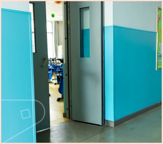 Atlantic Blue Satin uPVC Wall Cladding installed in school hallway high traffic area a durable wall solution.